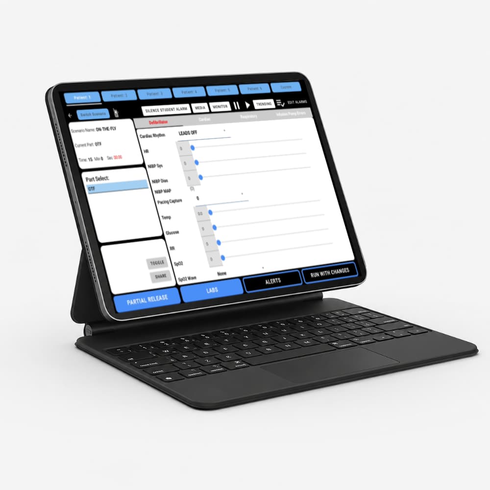 Instructor control tablet used to send alerts and vitals and monitor student responses across beds